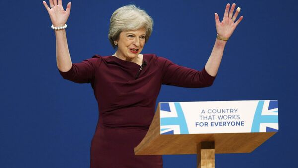Britain's Prime Minister Theresa May gives her speech on the final day of the annual Conservative Party Conference in Birmingham, Britain, October 5, 2016. - Sputnik International