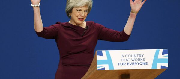 Britain's Prime Minister Theresa May gives her speech on the final day of the annual Conservative Party Conference in Birmingham, Britain, October 5, 2016. Britain's Prime Minister Theresa May gives her speech on the final day of the annual Conservative Party Conference in Birmingham, Britain, October 5, 2016. - Sputnik International