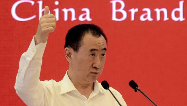 This picture taken on July 16, 2015 shows Wang Jianlin, chairman of property giant Wanda Group, attending the China Brand Forum in Beijing. - Sputnik International