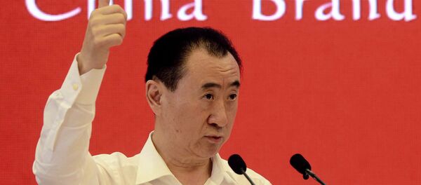 This picture taken on July 16, 2015 shows Wang Jianlin, chairman of property giant Wanda Group, attending the China Brand Forum in Beijing. - Sputnik International