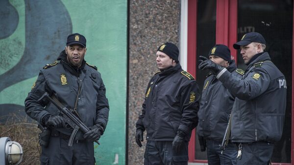 Policemen stand in front of a house in Ishoj, Denmark - Sputnik International