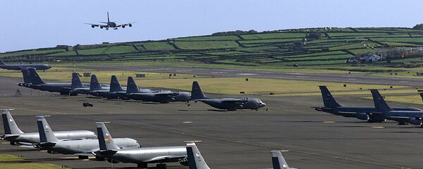 An undated file picture taken in March 2003 shows a US Air Force plane landing on the Base das Lajes, a US military base in the Portuguese archipelago of Azores. - Sputnik International