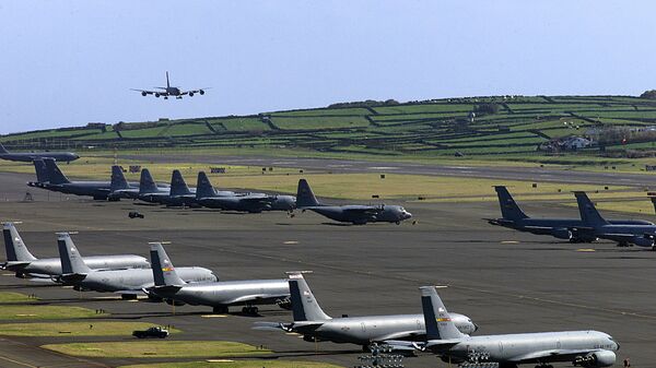 An undated file picture taken in March 2003 shows a US Air Force plane landing on the Base das Lajes, a US military base in the Portuguese archipelago of Azores. - Sputnik International