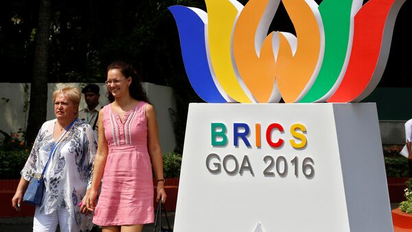 People walk out of one of the venues of BRICS (Brazil, Russia, India, China and South Africa) Summit, in Benaulim, in the western state of Goa, India, October 14, 2016. - Sputnik International