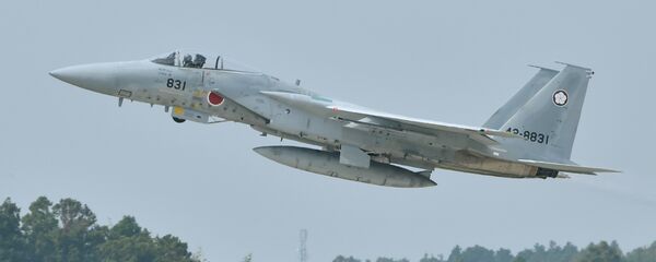 A Japan Air Self-Defense Forces F-15J/DJ takes off - Sputnik International