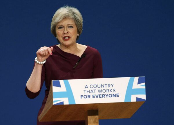 Britain's Prime Minister Theresa May gives her speech on the final day of the annual Conservative Party Conference in Birmingham, Britain, October 5, 2016.  - Sputnik International