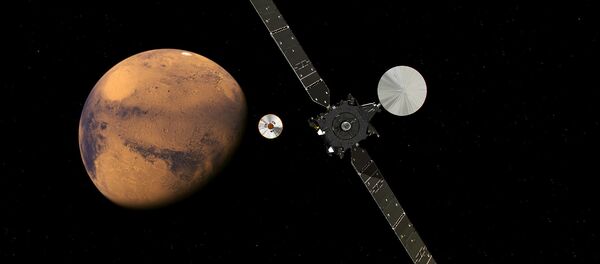 The ExoMars Trace Gas Orbiter and its entry, descent and landing demonstrator module, Schiaparelli, approaching Mars. The ExoMars Trace Gas Orbiter and its entry, descent and landing demonstrator module, Schiaparelli, approaching Mars. - Sputnik International