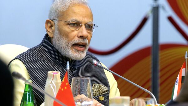 Indian Prime Minister Narendra Modi seen here at Taj Exotica Goa hotel, India at the BRICS Summit restricted meeting - Sputnik International