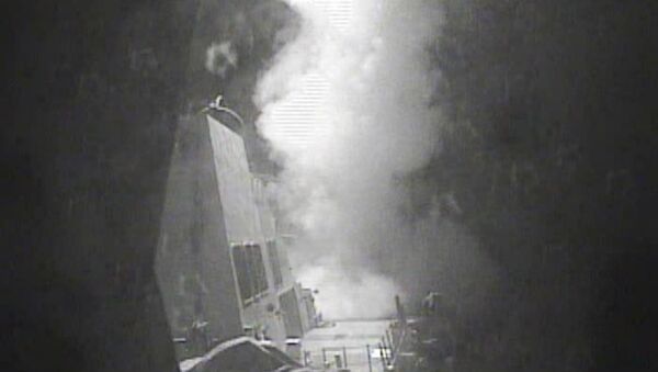 In this Thursday Oct. 13 photo released by US Navy, the guided missile destroyer USS Nitze (DDG 94) launches a strike against coastal sites in Houthi-controlled territory on Yemen's Red Sea coast - Sputnik International