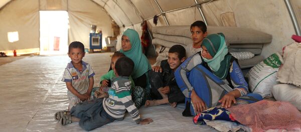 Displaced people who fled Mosul are pictured at a refugee camp in Duhok, Iraq, October 16, 2016 - Sputnik International