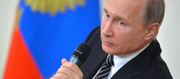 Russian President Vladimir Putin during the news conference following the meeting of the BRICS member states' leaders at Taj Exotica hotel in Goa, the Republic of India, October 16, 2016 - Sputnik International