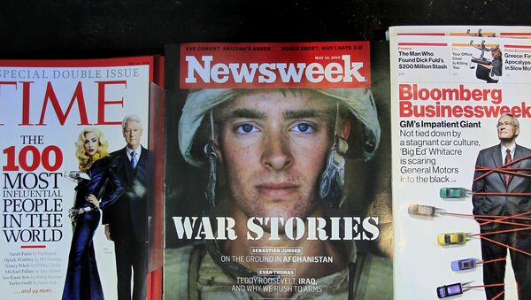 Newsweek magazine is displayed on a shelf at a news stand at South Station in Boston, Wednesday, May 5, 2010. The Washington Post Co. is putting Newsweek up for sale in hopes that another owner can figure out how to stem losses at the 77-year-old weekly magazine. - Sputnik International