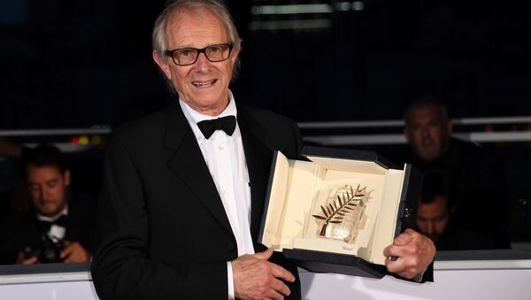British director Ken Loach poses after he was awarded the Palme d'Or for the film I, Daniel Blake on May 22, 2016 during a photocall at 69th Cannes Film Festival in Cannes, southern France. - Sputnik International