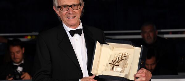 British director Ken Loach poses after he was awarded the Palme d'Or for the film I, Daniel Blake on May 22, 2016 during a photocall at 69th Cannes Film Festival in Cannes, southern France. British director Ken Loach poses after he was awarded the Palme d'Or for the film I, Daniel Blake on May 22, 2016 during a photocall at 69th Cannes Film Festival in Cannes, southern France. - Sputnik International