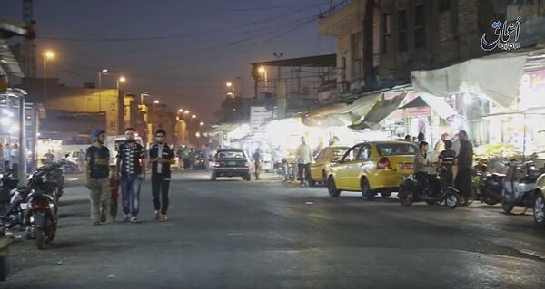 This image made from video posted online on Monday, Oct. 17, 2016 by Amaq News Agency of the Islamic State militant group shows a street scene in Mosul, Iraq This image made from video posted online on Monday, Oct. 17, 2016 by Amaq News Agency of the Islamic State militant group shows a street scene in Mosul, Iraq - Sputnik International