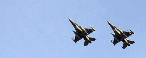 Two Belgian F-16 fighter jets. (File) Two Belgian F-16 fighter jets. (File) - Sputnik International
