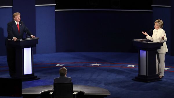 Democratic presidential nominee Hillary Clinton and Republican presidential nominee Donald Trump debate during the third presidential debate at UNLV in Las Vegas - Sputnik International