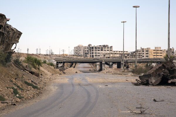 A general shows the rubble-strewn Castello Road, the main route for humanitarian assistance in to divided Syrian city of Aleppo. (File) A general shows the rubble-strewn Castello Road, the main route for humanitarian assistance in to divided Syrian city of Aleppo. (File) - Sputnik International