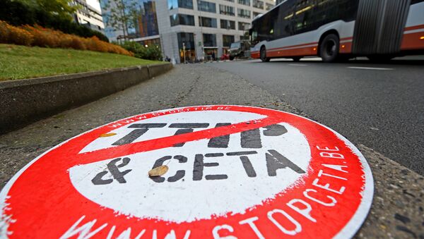 A placard reading STOP TTIP CETA is seen outside the EU Council headquarters ahead of a European Union leaders summit in Brussels, Belgium October 20, 2016. - Sputnik International