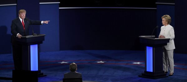 Republican U.S. presidential nominee Donald Trump speaks as Democratic U.S. presidential nominee Hillary Clinton listens during their third and final 2016 presidential campaign debate Republican U.S. presidential nominee Donald Trump speaks as Democratic U.S. presidential nominee Hillary Clinton listens during their third and final 2016 presidential campaign debate - Sputnik International