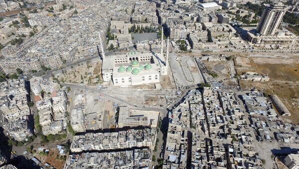 A general view taken with a drone shows a mosque where forces loyal to Syria's President Bashar al-Assad are stationed in Aleppo's government-controlled area of al-Masharqa, Syria October 20, 2016. - Sputnik International