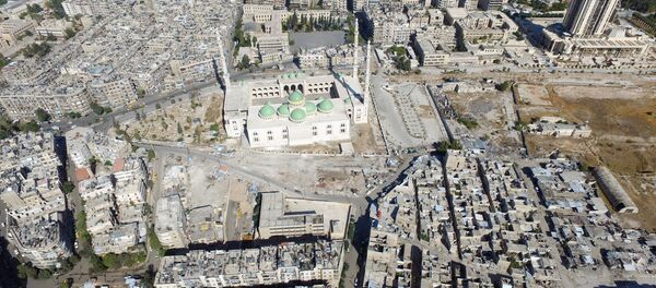 A general view taken with a drone shows a mosque where forces loyal to Syria's President Bashar al-Assad are stationed in Aleppo's government-controlled area of al-Masharqa, Syria October 20, 2016. A general view taken with a drone shows a mosque where forces loyal to Syria's President Bashar al-Assad are stationed in Aleppo's government-controlled area of al-Masharqa, Syria October 20, 2016. - Sputnik International