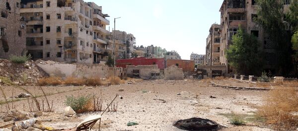 A view shows what is believed to be one of the roads that people would have to use to access one of the safe exit points opened for people wishing to leave rebel-held areas, in Aleppo's Bustan al-Qasr, Syria October 20, 2016. A view shows what is believed to be one of the roads that people would have to use to access one of the safe exit points opened for people wishing to leave rebel-held areas, in Aleppo's Bustan al-Qasr, Syria October 20, 2016. - Sputnik International