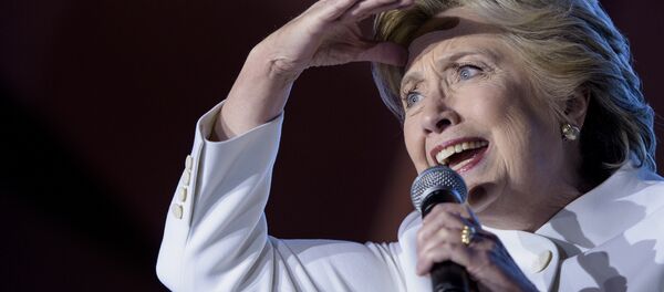 Democratic presidential nominee Hillary Clinton speaks to supporters at Craig Ranch Regional Park Amphitheater after the final presidential debate at the University of Nevada October 19, 2016 in North Las Vegas, Nevada. Democratic presidential nominee Hillary Clinton speaks to supporters at Craig Ranch Regional Park Amphitheater after the final presidential debate at the University of Nevada October 19, 2016 in North Las Vegas, Nevada. - Sputnik International