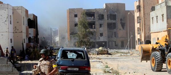 Fighters of Libyan forces allied with the U.N.-backed government gather at the eastern frontline of fighting with Islamic State militants, in Sirte, Libya Fighters of Libyan forces allied with the U.N.-backed government gather at the eastern frontline of fighting with Islamic State militants, in Sirte, Libya - Sputnik International