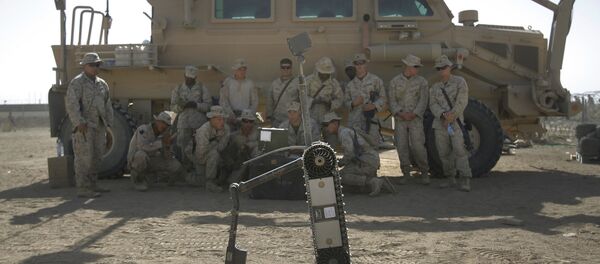 US Marines from the 2nd Marine Expeditionary Brigade are taught how to use a robot to search for improvised explosive devices during training lesson at Camp Leatherneck in Afghanistan's Helmand province Tuesday June 9, 2009. US Marines from the 2nd Marine Expeditionary Brigade are taught how to use a robot to search for improvised explosive devices during training lesson at Camp Leatherneck in Afghanistan's Helmand province Tuesday June 9, 2009. - Sputnik International