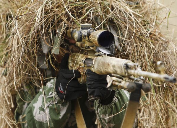 A sniper is seen during the Southern Military District’s Special Purpose Brigade drills in the Krasnodar region. - Sputnik International