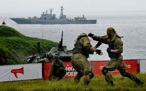 Marines of the Pacific Fleet participate in the Race of Heroes in Vladivostok at the Gornostai military training grounds. The Race of Heroes is a sports project with simulated combat operations. - Sputnik International