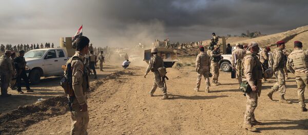 Iraqi army soldiers wait for an attack to begin against the Islamic State group of Mosul, Iraq, Thursday, Oct. 20, 2016 Iraqi army soldiers wait for an attack to begin against the Islamic State group of Mosul, Iraq, Thursday, Oct. 20, 2016 - Sputnik International