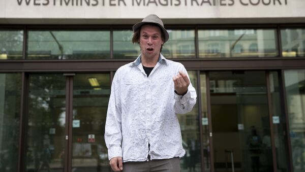 Lauri Love poses for photographers as he arrives at Westminster Magistrates Court in central London on July 25, 2016. - Sputnik International