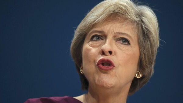 Britain's Prime Minister Theresa May gives her speech on the final day of the annual Conservative Party Conference in Birmingham, Britain, October 5, 2016. - Sputnik International