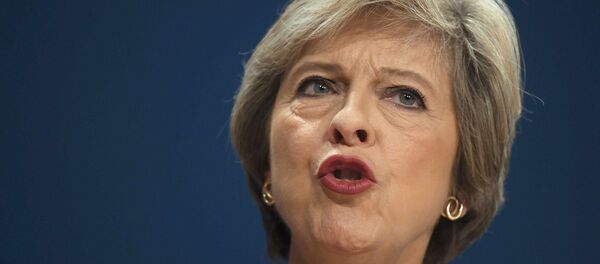 Britain's Prime Minister Theresa May gives her speech on the final day of the annual Conservative Party Conference in Birmingham, Britain, October 5, 2016. Britain's Prime Minister Theresa May gives her speech on the final day of the annual Conservative Party Conference in Birmingham, Britain, October 5, 2016. - Sputnik International
