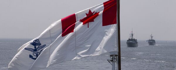 The Royal Canadian Navy Ensign flies on the HMCS Kingston and HMCS Moncton sail behind during the Parade of Ships entering the New York Harbor, Wednesday, May 25, 2016 The Royal Canadian Navy Ensign flies on the HMCS Kingston and HMCS Moncton sail behind during the Parade of Ships entering the New York Harbor, Wednesday, May 25, 2016 - Sputnik International