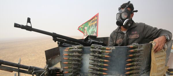 Iraqi forces gather in the al-Shura area, south of Mosul, on October 24, 2016, during an operation to retake the main hub city from the Islamic State (IS) group jihadists - Sputnik International