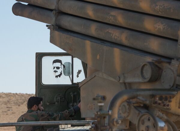 A soldier of the Syrian Arab Army (SAA) near the town of Mhin, Syria A soldier of the Syrian Arab Army (SAA) near the town of Mhin, Syria - Sputnik International