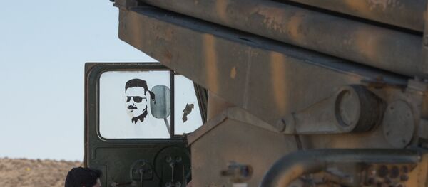 A soldier of the Syrian Arab Army (SAA) near the town of Mhin, Syria A soldier of the Syrian Arab Army (SAA) near the town of Mhin, Syria - Sputnik International