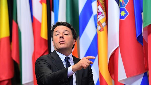 Italian Prime Minister Matteo Renzi points a finger as he leaves the European Union leaders summit on October 21, 2016 at the European Council, in Brussels - Sputnik International
