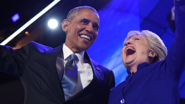 US President Barack Obama (L) hugs US Presidential nominee Hillary Clinton during the third night of the Democratic National Convention at the Wells Fargo Center in Philadelphia, Pennsylvania, July 27, 2016 - Sputnik International