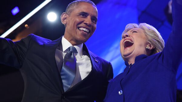 US President Barack Obama (L) hugs US Presidential nominee Hillary Clinton during the third night of the Democratic National Convention at the Wells Fargo Center in Philadelphia, Pennsylvania, July 27, 2016 - Sputnik International