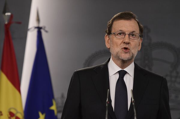 Spanish Prime Minister Mariano Rajoy speaks during a press conference at the Moncloa Palace in Madrid on October 25, 2016 Spanish Prime Minister Mariano Rajoy speaks during a press conference at the Moncloa Palace in Madrid on October 25, 2016 - Sputnik International