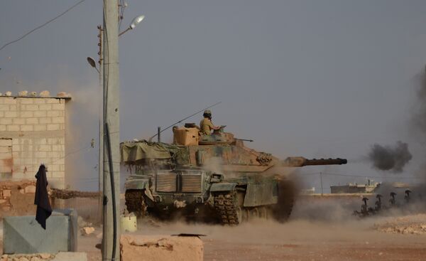 Turkish soldiers fire an upgraded M60 tank during fighting against Daesh terrorists near the northern Syrian village of Beraan, north of the embattled city of Aleppo, on October 24, 2016 Turkish soldiers fire an upgraded M60 tank during fighting against Daesh terrorists near the northern Syrian village of Beraan, north of the embattled city of Aleppo, on October 24, 2016 - Sputnik International
