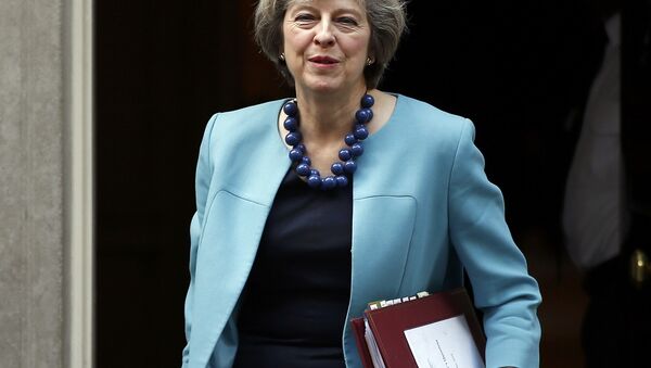 Britain's Prime Minister, Theresa May, leaves 10 Downing Street to attend Prime Minister's Questions in the House of Commons, in London, Britain October 26, 2016. - Sputnik International