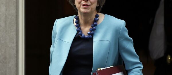Britain's Prime Minister, Theresa May, leaves 10 Downing Street to attend Prime Minister's Questions in the House of Commons, in London, Britain October 26, 2016. Britain's Prime Minister, Theresa May, leaves 10 Downing Street to attend Prime Minister's Questions in the House of Commons, in London, Britain October 26, 2016. - Sputnik International