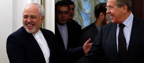 Russian Foreign Minister Sergei Lavrov (R) shakes hands with his Iranian counterpart Mohammad Javad Zarif during a meeting in Moscow, Russia, October 28, 2016 Russian Foreign Minister Sergei Lavrov (R) shakes hands with his Iranian counterpart Mohammad Javad Zarif during a meeting in Moscow, Russia, October 28, 2016 - Sputnik International