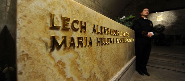 A Wawel Castle employee stands by the tomb of late Polish President Lech Kaczynski and his wife Maria after their burial in the crypt of Wawel Castle's Cathedral. (File) A Wawel Castle employee stands by the tomb of late Polish President Lech Kaczynski and his wife Maria after their burial in the crypt of Wawel Castle's Cathedral. (File) - Sputnik International