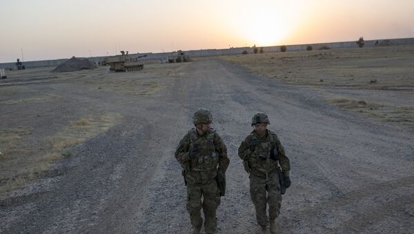 US soldiers walking at the Qayyarah military base during the ongoing operation to recapture the last major Iraqi city under the control of the Islamic State (IS) group jihadists. (File) - Sputnik International